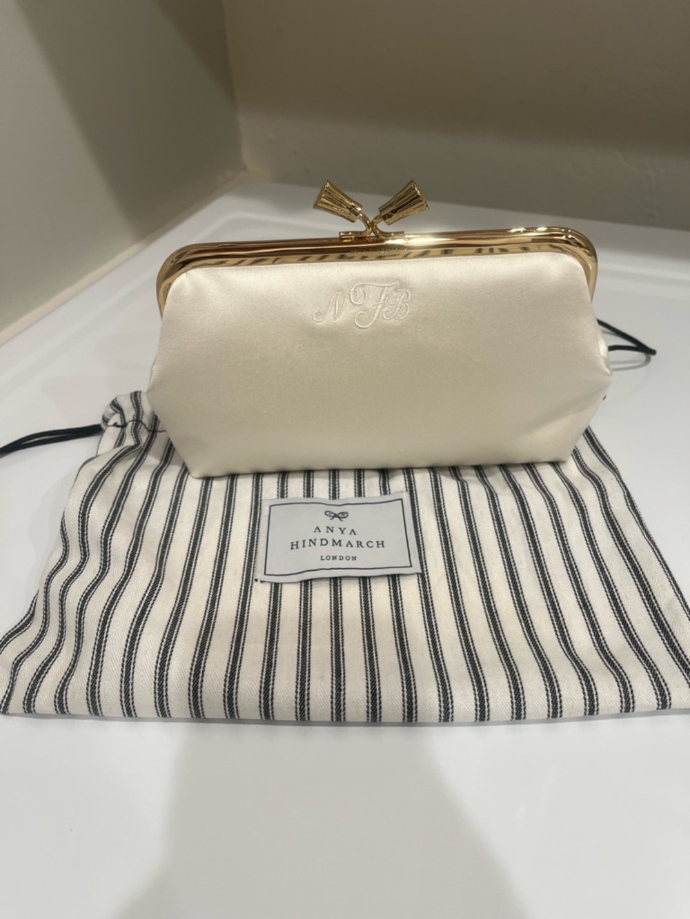 Anya Hindmarch Ivory Satin Kiss-Lock Wristlet Clutch With Personalized Letter